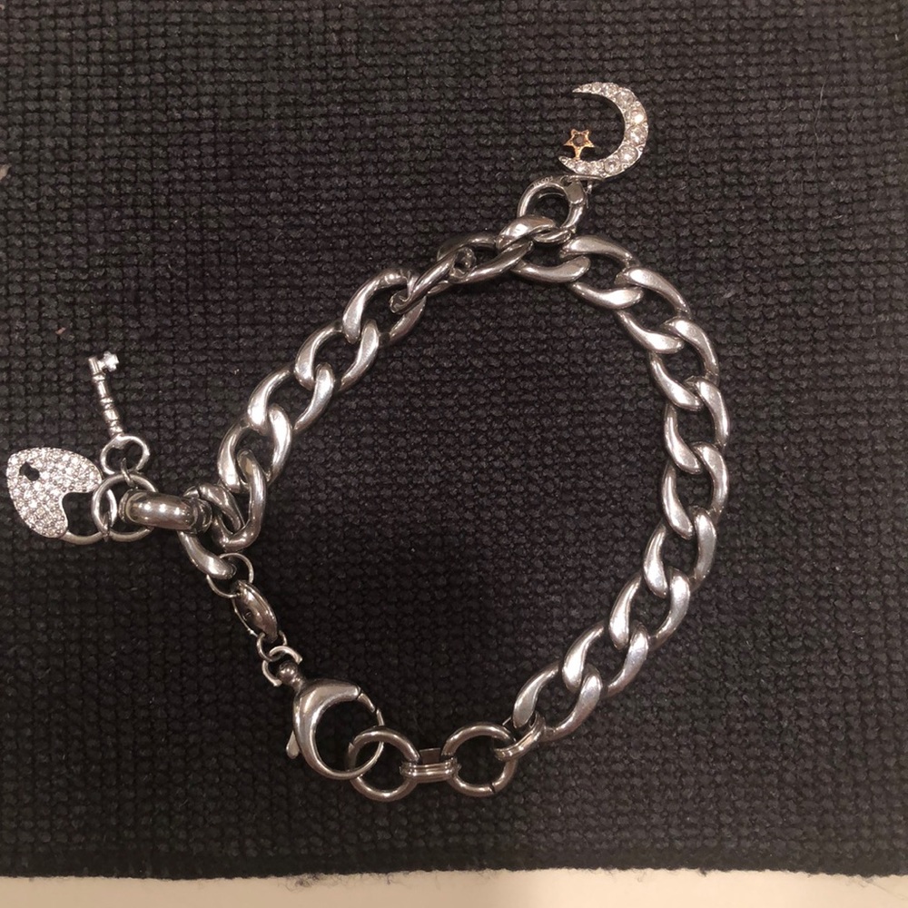 Discontinued NWOT Fossil charm bracelet w/2 charms